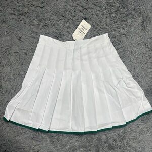 White Pleated Skirt with Green Trim